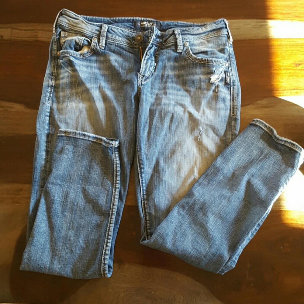 Silver skinny, slight distressed jean waist 29